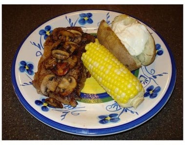 Smothered Steak On Baked Potatoes