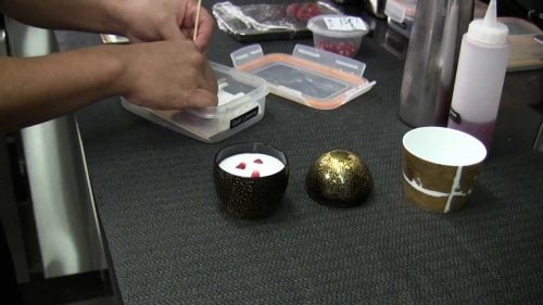 Benites prepares a pre-dessert at Joël Robuchon, Singapore