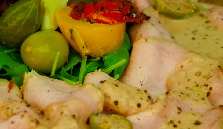 a closeup photo of a plate with vitello tonnato recipe.